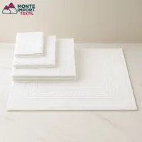 Toallas de hosteleria blancas profesionales para hoteles de 450 gramos en 100% algodón con greca clásica y doble costura – Monte Import Textil