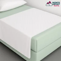 Empapador de cama de 5 capas con alas y asas 90x85 cm para uso sanitario y hospitalario en color blanco